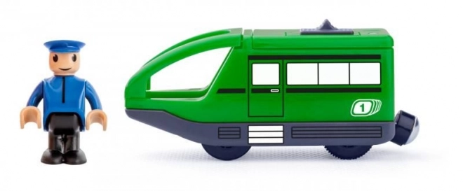 Groene trein met spoor en bestuurder op batterijen