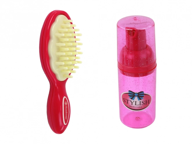 Stilvoller rosa Kinderkoffer mit Kosmetikzubehör