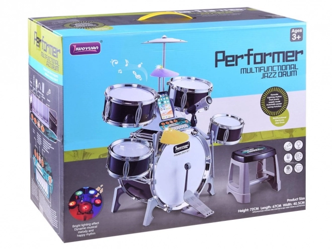 Children's drum set with microphone and music panel