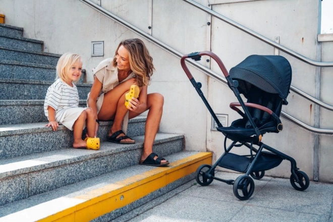 Sportieve kinderwagen MoMi ADELLE zwart goud 2023