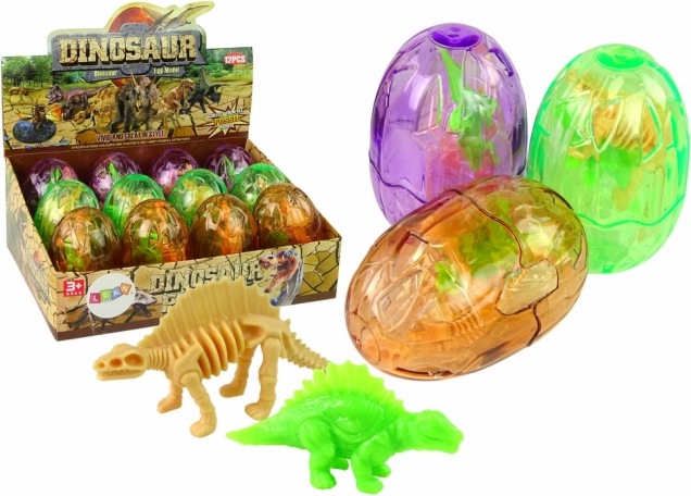 Large transparent dinosaur egg with 2 figurines, 9 cm
