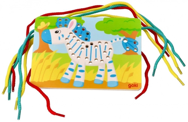 Kleurrijke zebra met rijgspeelgoed