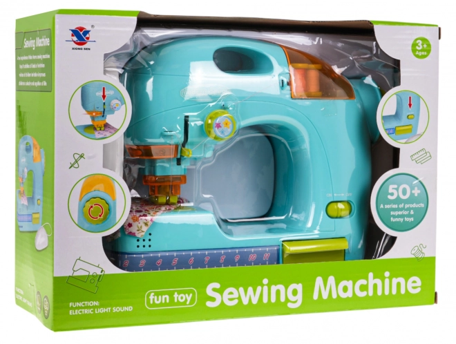 Blauwe naaimachine + accessoires