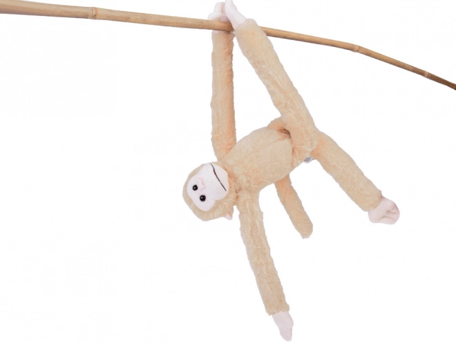 Mascotte singe suspendue de couleur beige