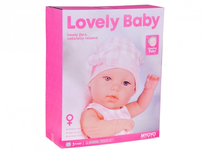 Stoffen paspop pasgeborene met roze muts