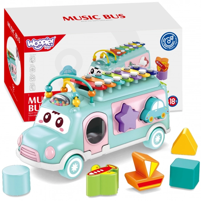 Voiture musicale avec trieur et xylophone vert Woopie