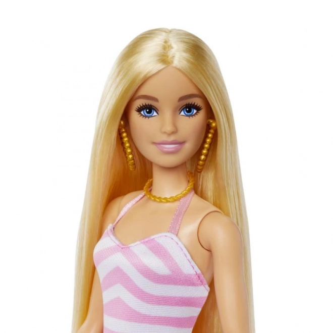 Barbie am Strand mit Sommeraccessoires