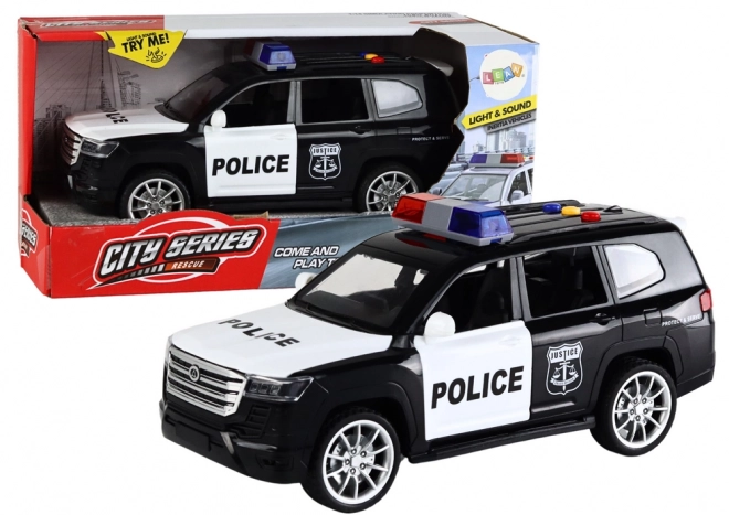 Politiewagen met effecten, open deuren en schaal 1:14