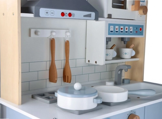 Grote houten interactieve keuken met accessoires