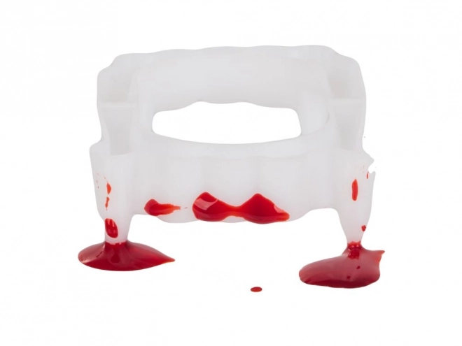 Set van nep tanden en bloed voor Halloween