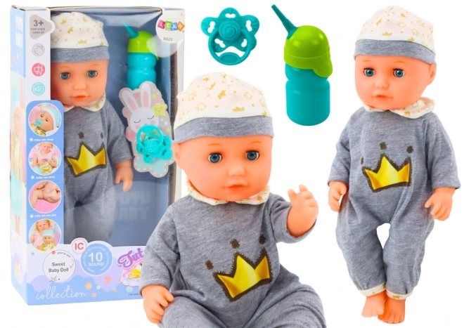 Interaktive Babypuppe im grauen Pyjama
