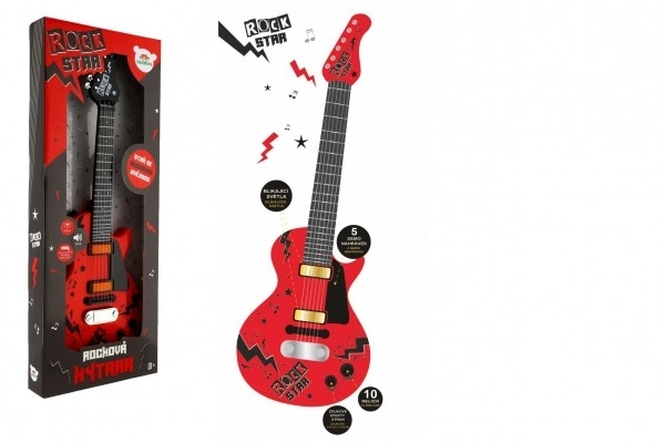 Elektrische Gitaar ROCK STAR plastic 58cm op batterijen met geluid, licht in doos 24x62x5,5cm