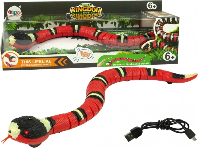 Serpent interactif à commande tactile rouge avec bandes noires