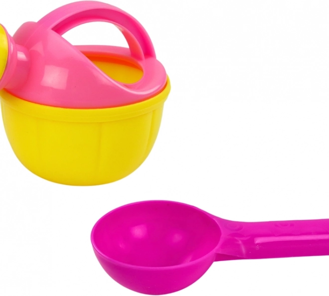 Gieter en schepje voor comfortabel spelen