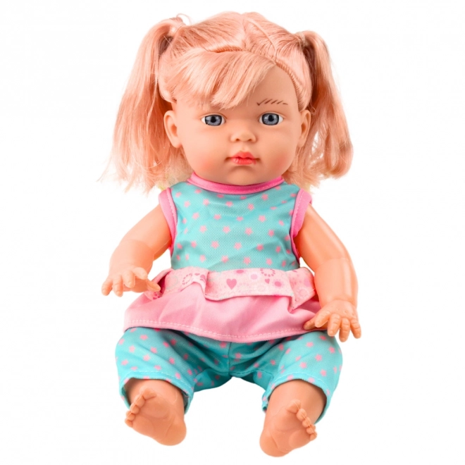 Poppenbaby in turquoise set met flesje en geluid