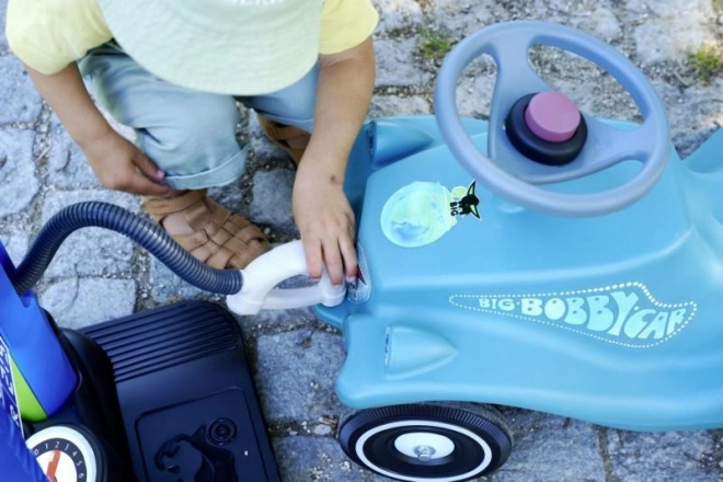 Auto duwwagen met aanhangwagen in turquoise kleur