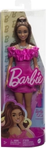 Barbie model in pink ruffled dress