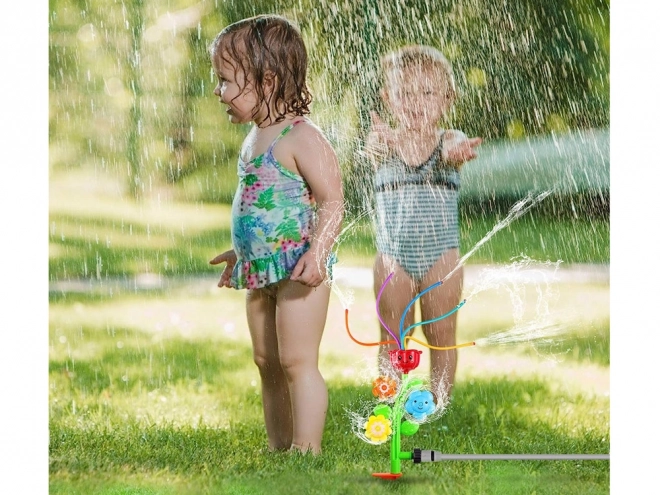 Fröhlicher Blumen-Kinderwasser-Sprinkler