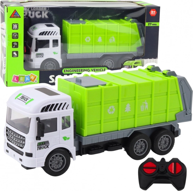 Groene op afstand bestuurbare vuilniswagen 1:24
