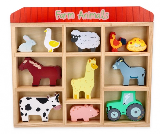 Houten set van boerderijdieren in een lijst
