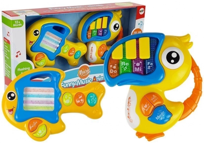 Interaktives Spielzeug Klavier und Gitarre Papagei und Fisch