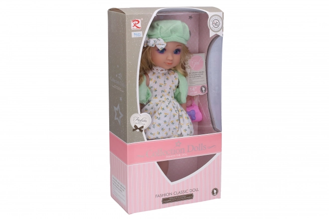 Pop met handtas, muts en geluidseffecten 36 cm