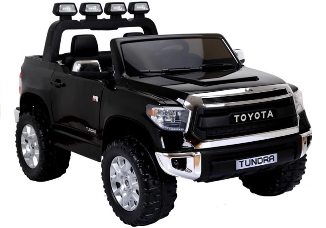 Zwarte elektrische kinderauto Toyota Tundra