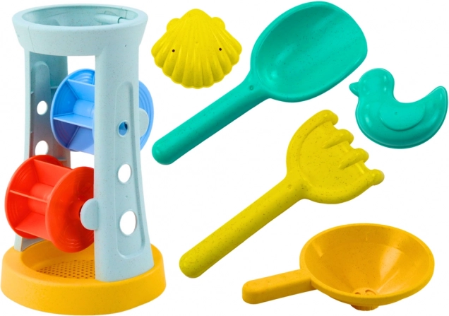 ensemble de jouets de sable avec moulin, pelle, râteau et moules
