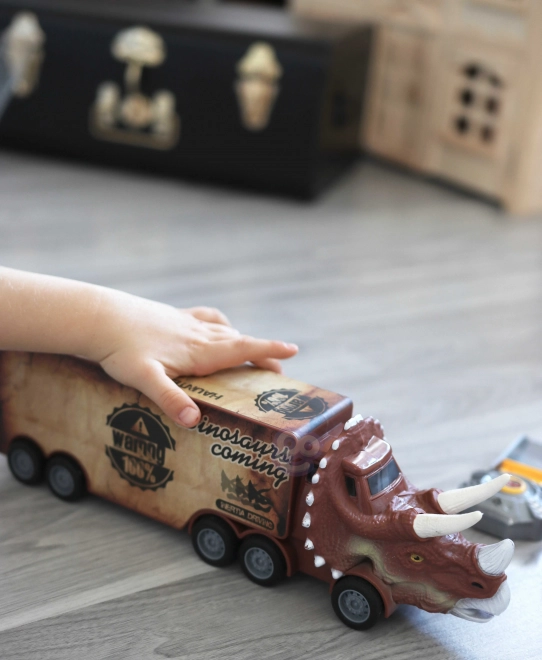 Dinosaurier-Lkw mit Werfer und Autos