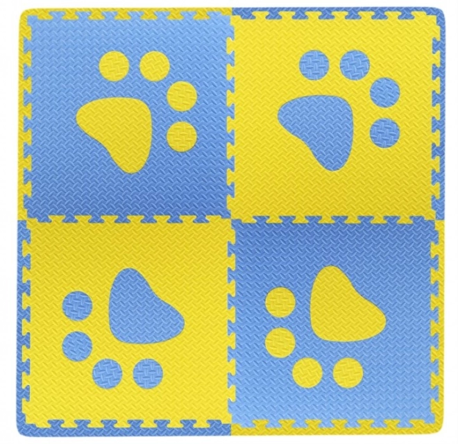 Foam children's rug with blue and yellow paw prints