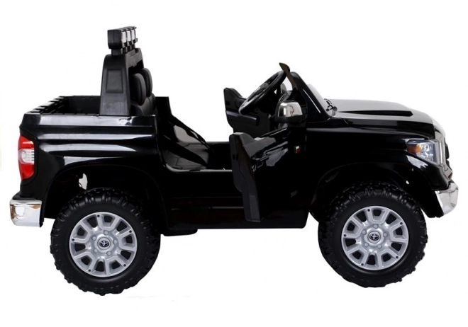 Zwarte elektrische kinderauto Toyota Tundra