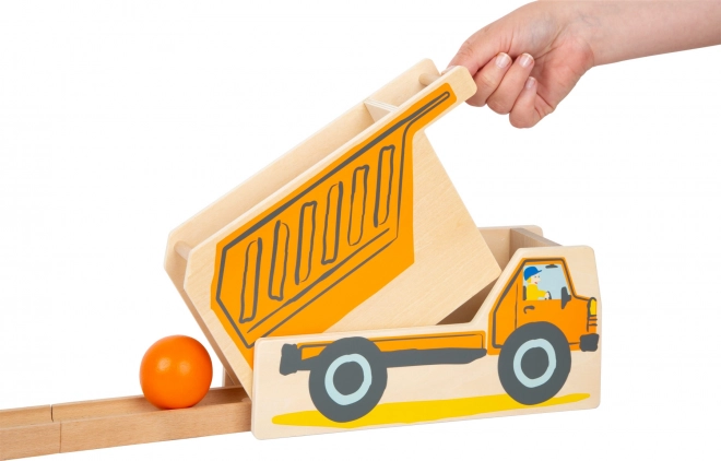 Construction machines in action: excavator and dump truck