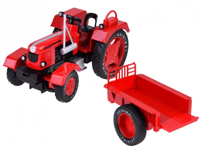 Rode metalen tractor met rubberen wielen 1:18