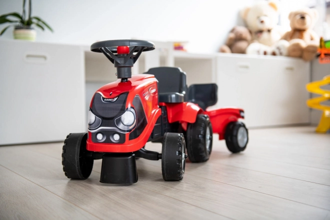 Rijtractor Baby Case IH rood met aanhanger