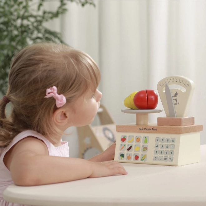 Kinderhouten weegschaal
