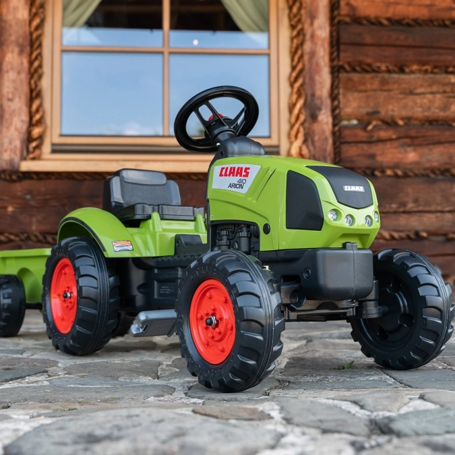 Tracteur Claas Arion 410 à pédales avec remorque vert