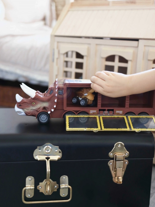Dinosaurier-Lkw mit Werfer und Autos