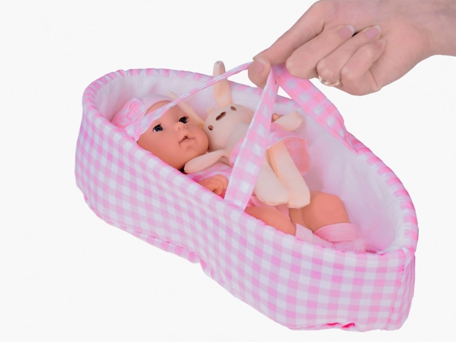Stoffen paspop pasgeborene met roze muts