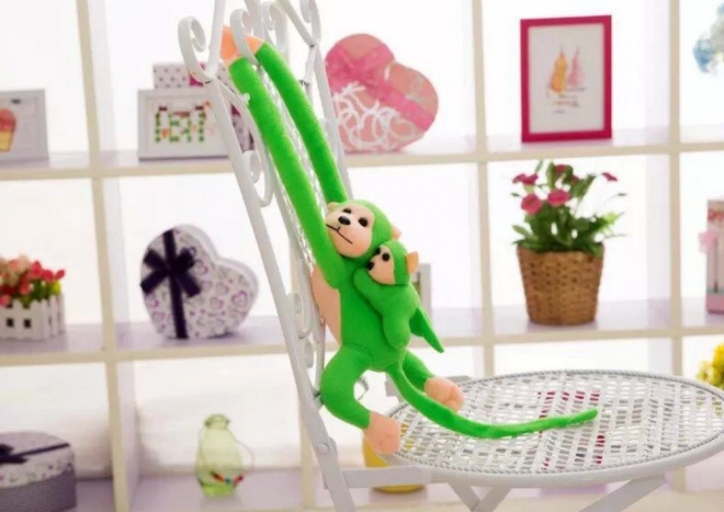 Pluchen aap met groen kindje 70 cm