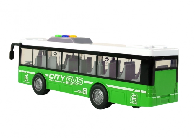 Interactieve groene bus op batterijen met frictieaandrijving 1:16 – Groen