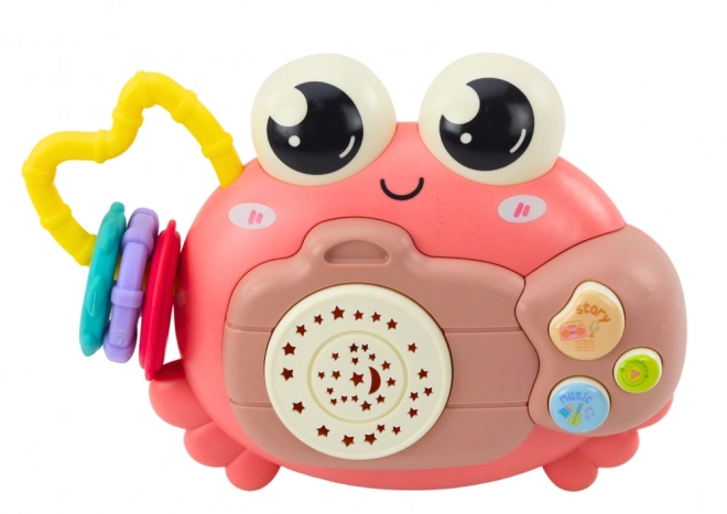 Roze interactieve krab met projector en rammelaar op batterijen