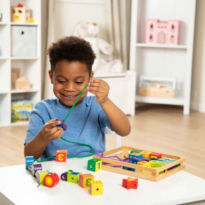 Große Perlen zum Auffädeln für Kinder