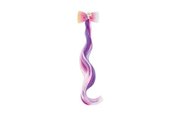 Haarclip met een regenboogkleurige eenhoorn charm