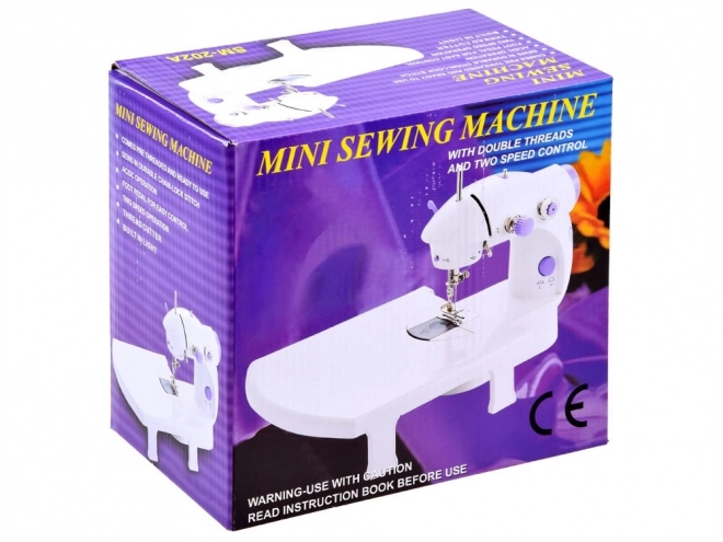 Machine à coudre mini avec pédale et table