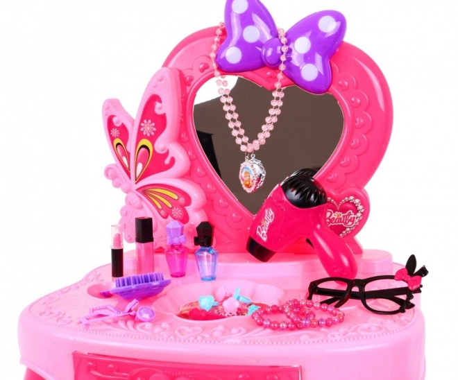 Roze kaptafel met spiegel en stoeltje + stylingaccessoires en föhn