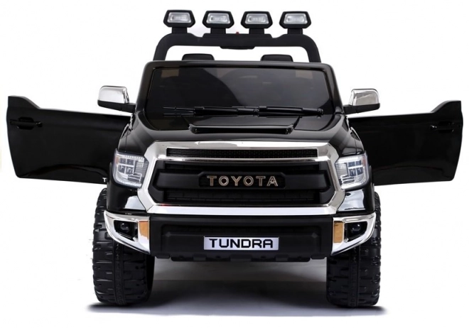 Zwarte elektrische kinderauto Toyota Tundra