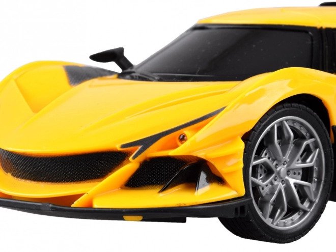 Raceauto met afstandsbediening en accessoires – Geel