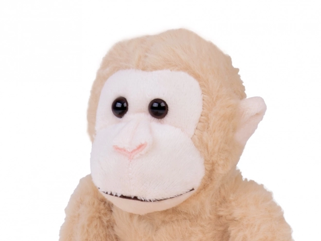 Mascotte singe suspendue de couleur beige