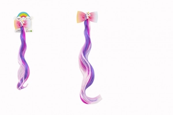Haarclip met een regenboogkleurige eenhoorn charm