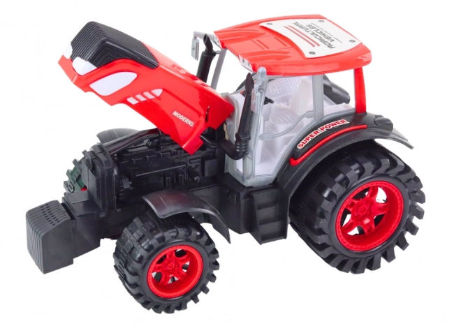 Grote tractor met aanhanger en pakken hooi